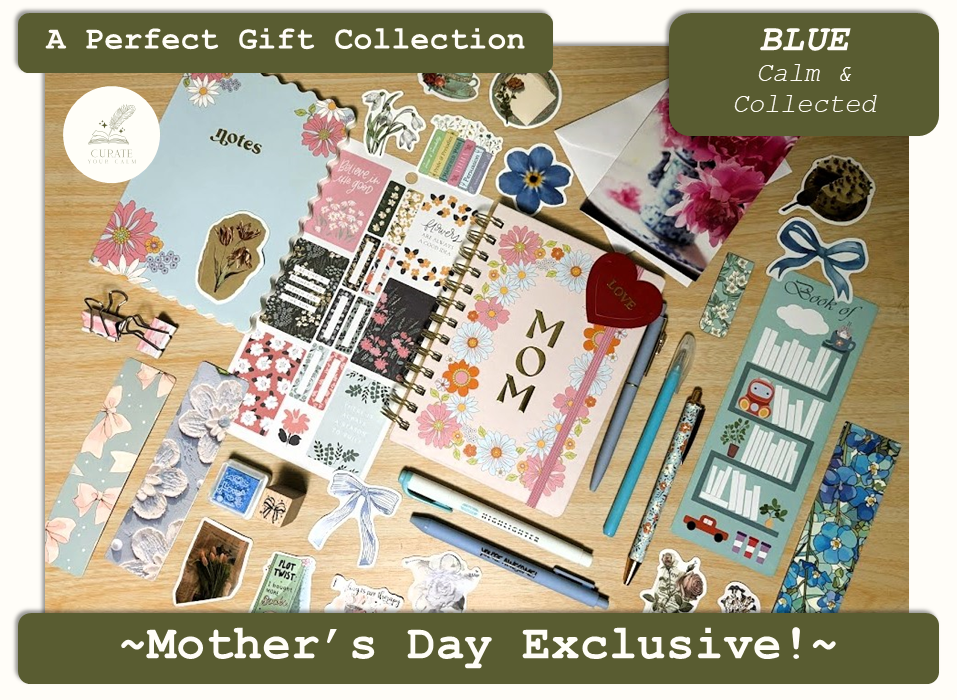 Mother's Day Exclusive Journaling Bundle in the Blue: Calm and Collected theme, with a 5"x7" "MOM" spiral-bound journal surrounded by various themed journaling items such as bookmarks, pens, markers, stickers and more.